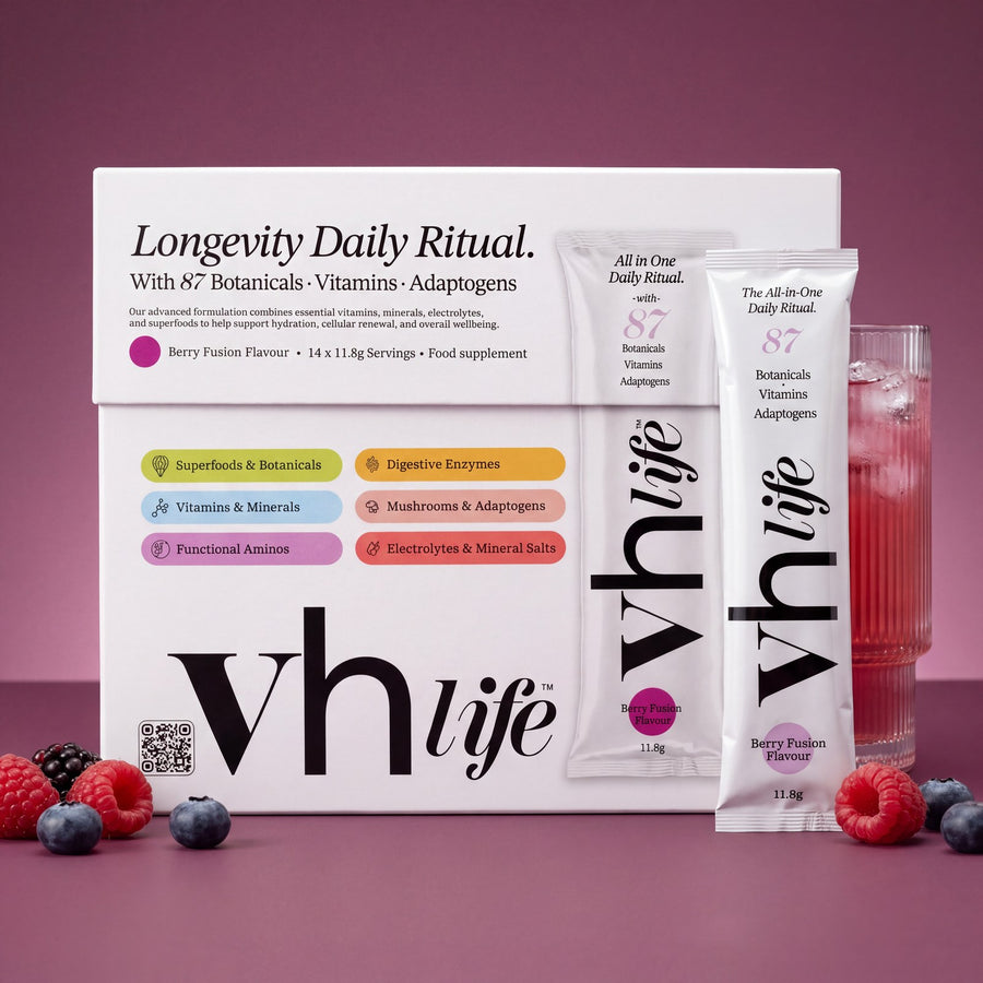 The VH Life box front with a sachet and a glass of the berry drink